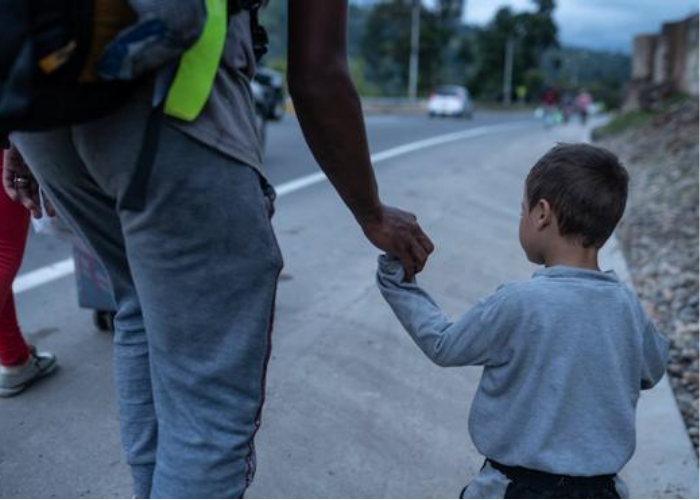 child holding hand in Venezuela